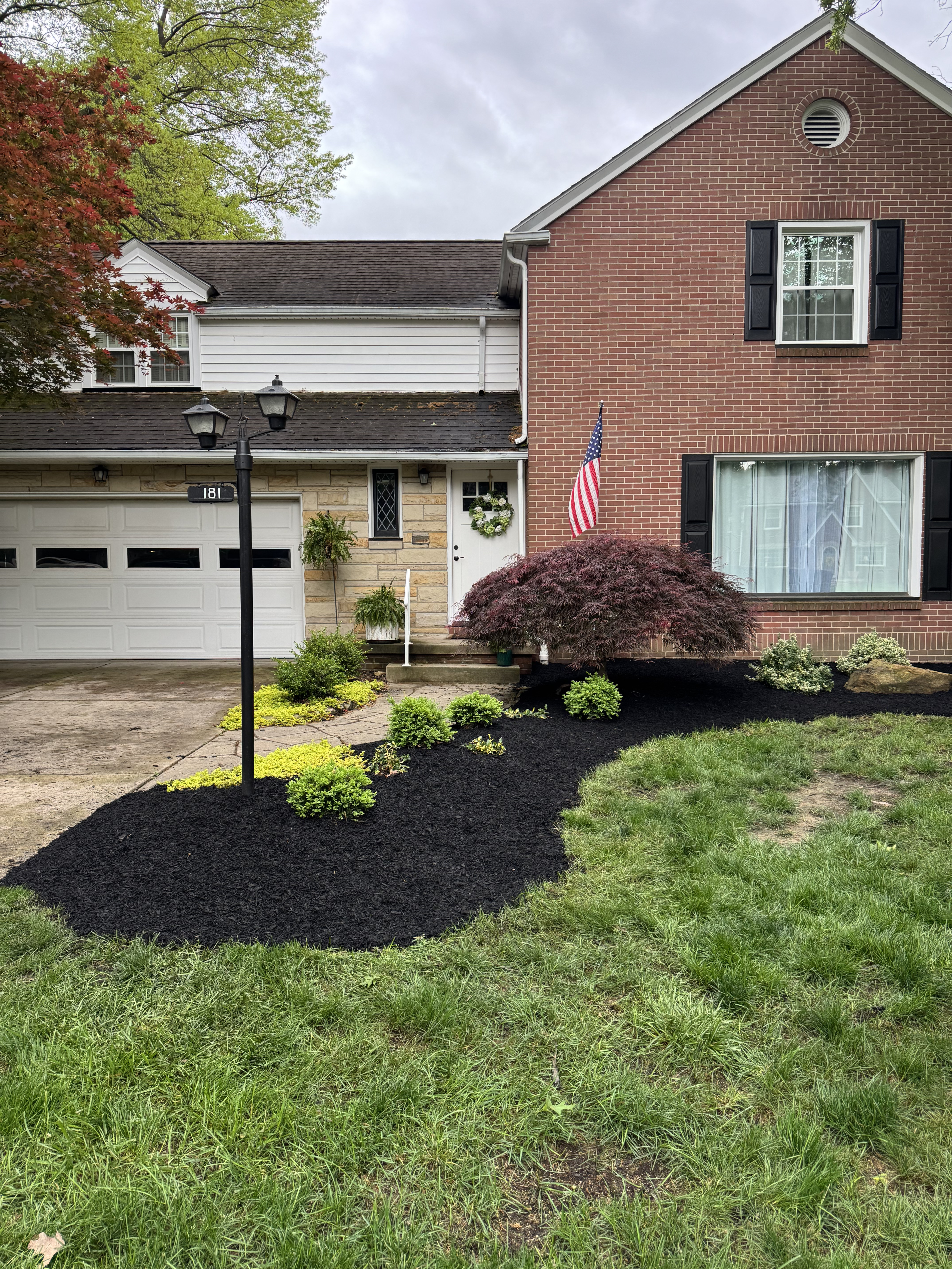 Fresh mulch beds after refresh
