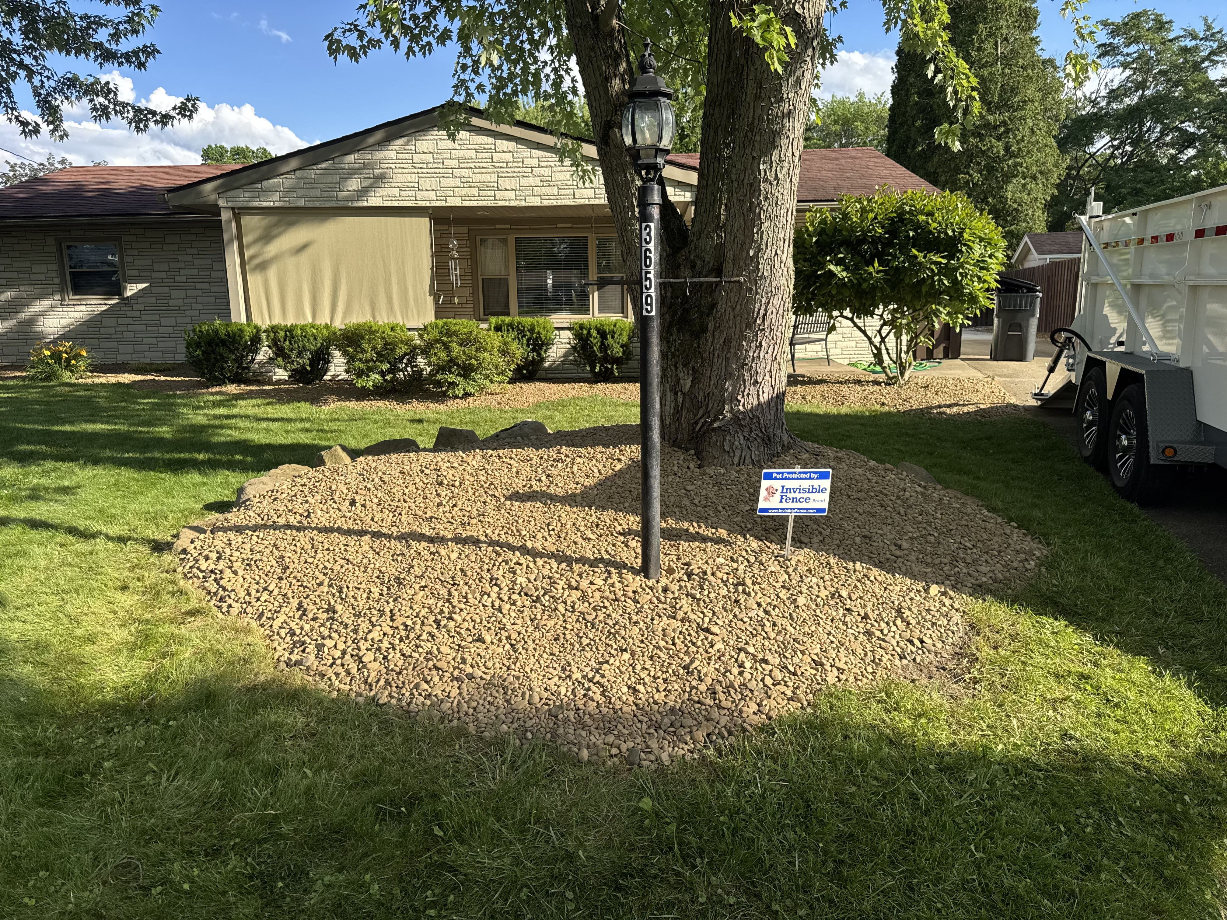 Stone landscape bed after cleanup